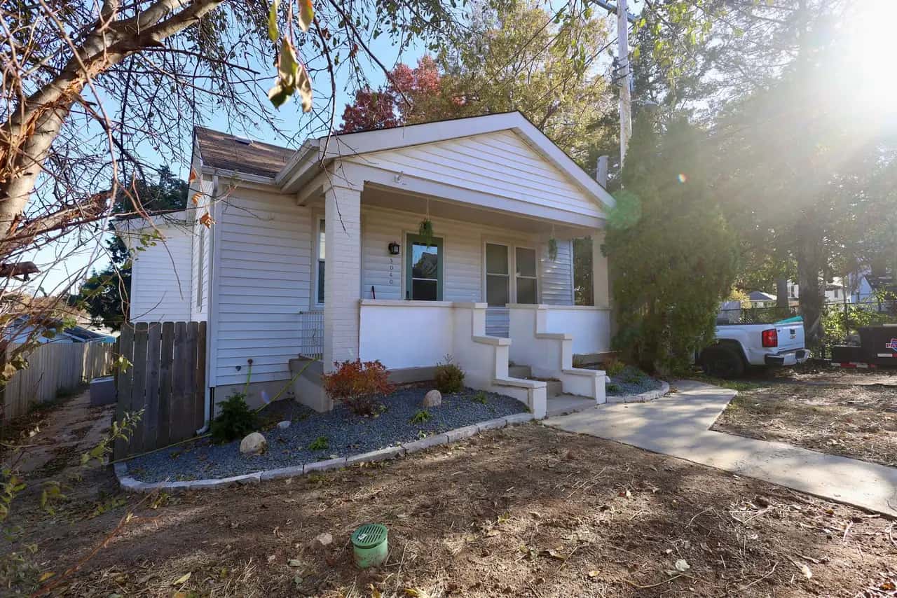 Front porch with new walkway and gravel garden bed